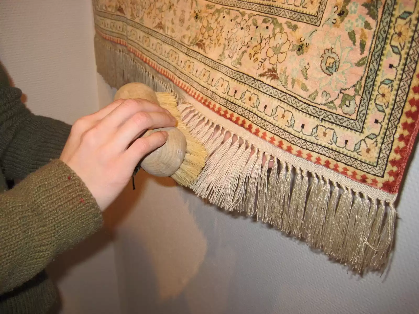 Professional hand cleaning of oriental rug fringes