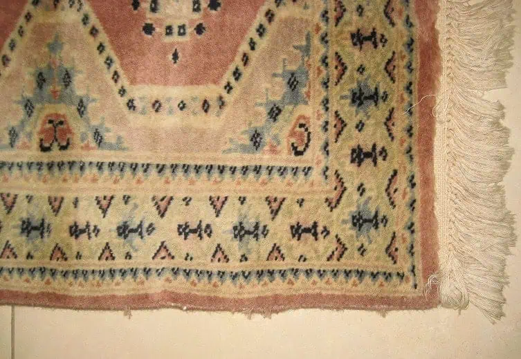 Fully repaired and revitalized hand-knotted oriental carpet, returned to its original integrity and beauty.