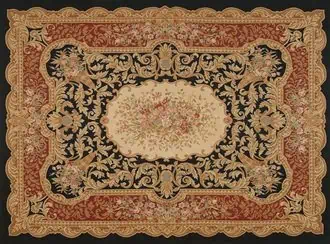 Aubusson carpet with elegant beige medallion on a black background.