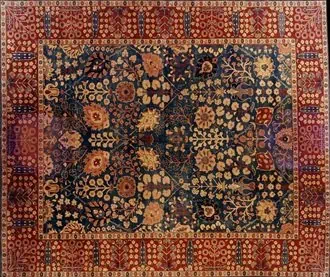 Agra carpet from India with all-over floral design on blue indigo background.